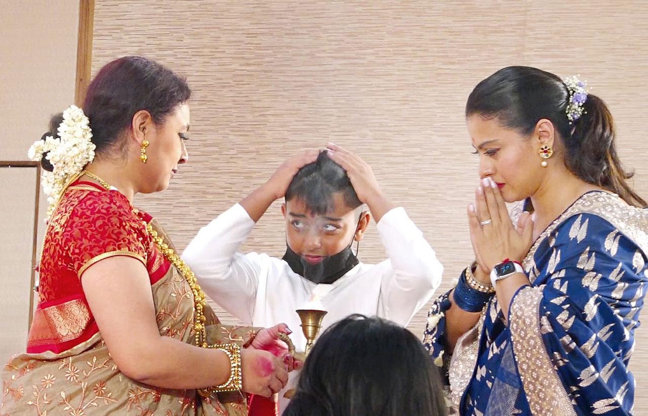Seen here are Kajol and Yug Devgn with Sharbani Mukherjee after the aarti. (Pic: Yogen Shah)