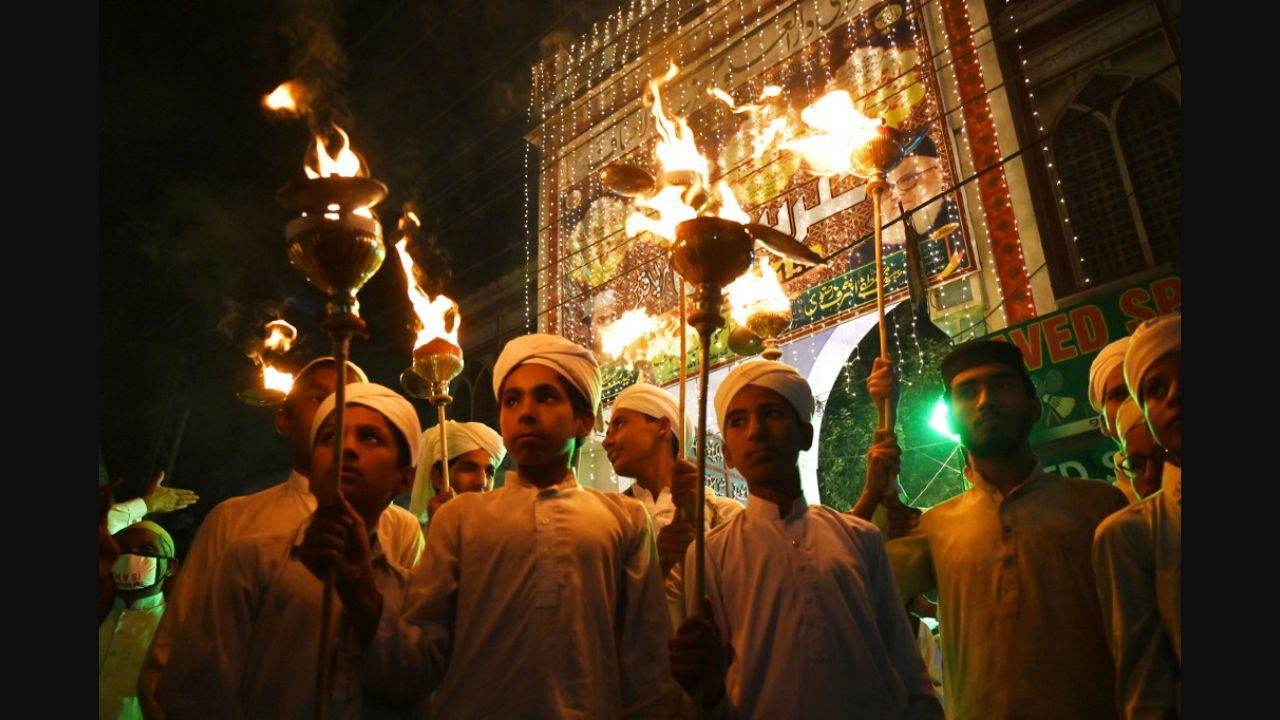 Special morning prayers are offered at mosques across Pakistan on Eid-e-Milad-un-Nabi. Many religious leaders and scholars preach the Prophet’s teachings. In this photo, Muslim kids hold torch lights during a rally ahead of celebrations in Lahore on October 29, 2020. Pic/AFP