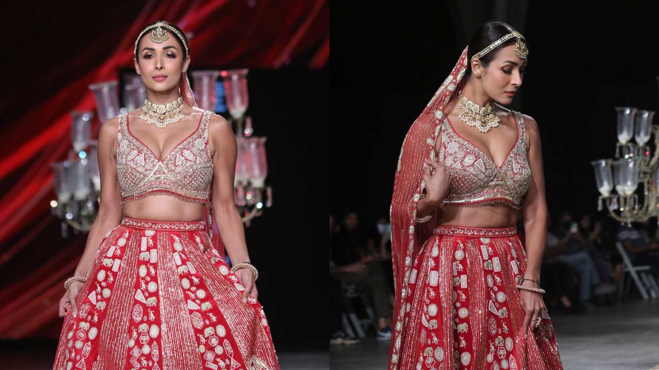 Malaika Arora turned heads as she walked the ramp in a perfect bridal wear. Malaika turned showstopper for designer Annu, where the model donned an embroidered red lehenga, leaving everyone awestruck as she walked the ramp. Doesn't she look mesmerisingly gorgeous in this one?