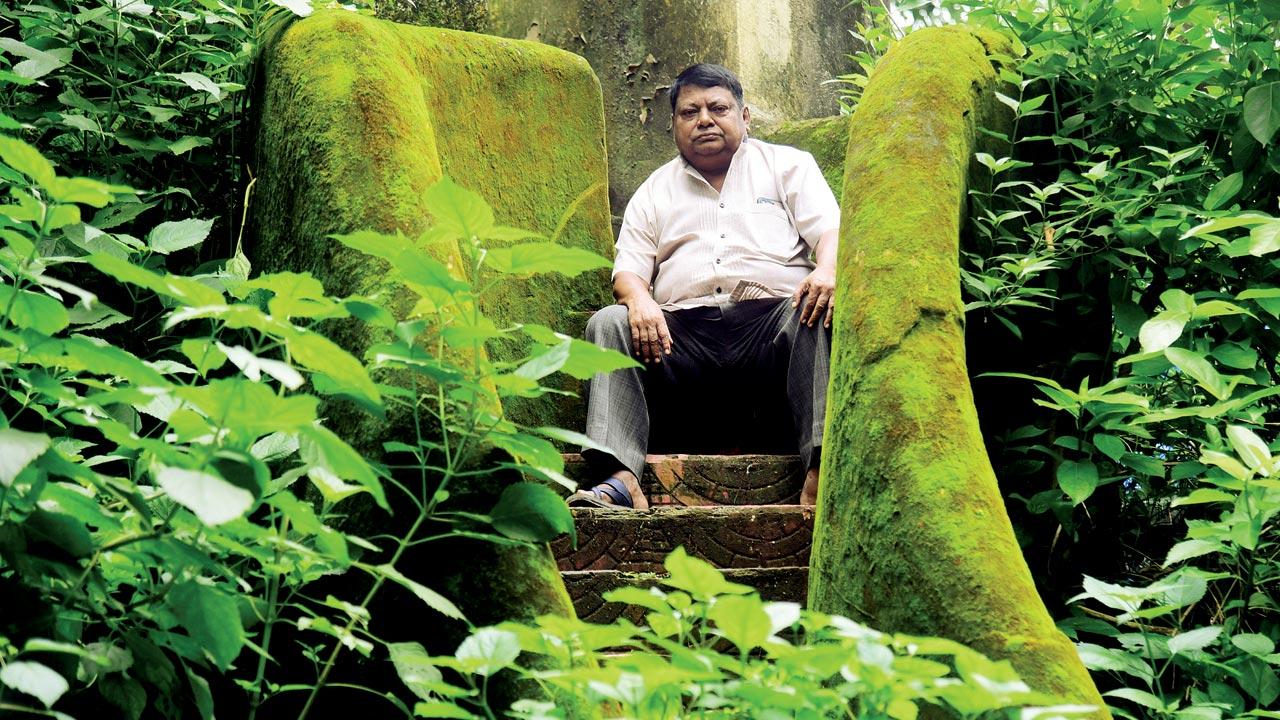 Arun Keni outside his Koliwada home