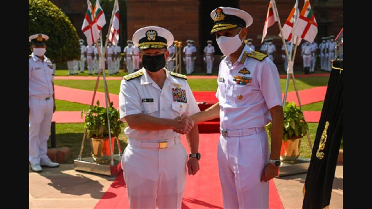 India Navy chief Admiral Karambir Singh (R) shakes hands with Chief of US naval operations Admiral Michael M Gilday prior to a meeting in New Delhi.