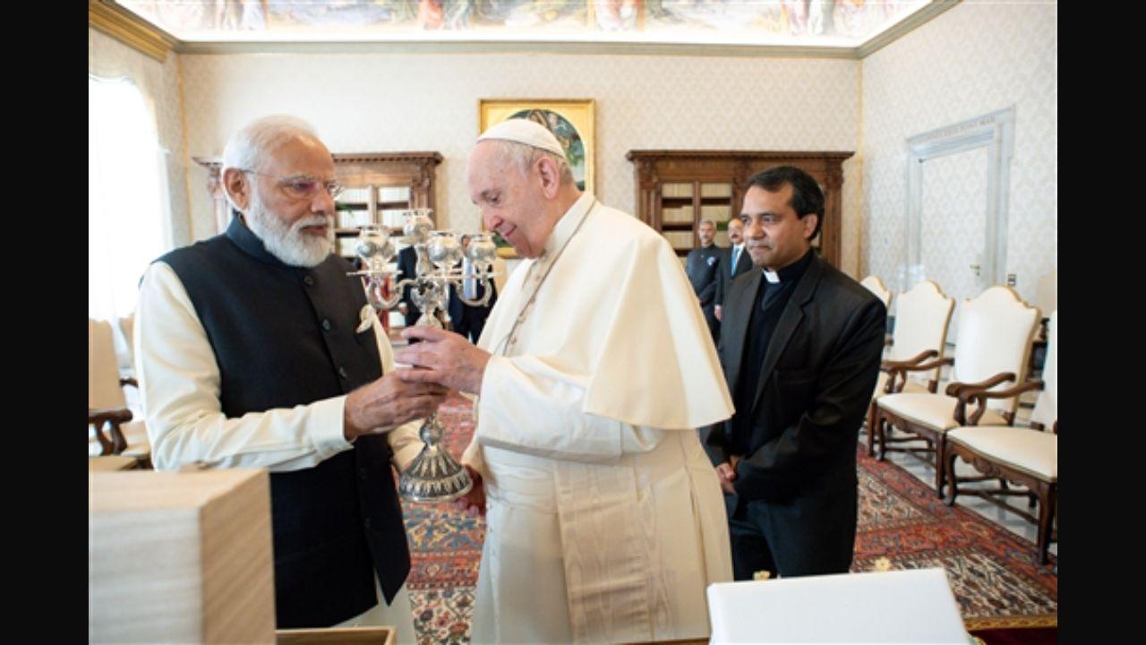 Modi gifted a specially-made silver candelabra and a book on India's climate initiatives to Pope Francis.