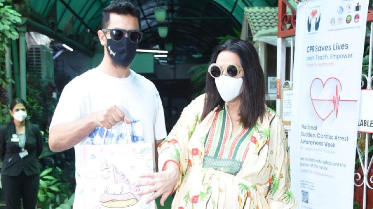Neha Dhupia and Angad Bedi, who tied the knot in a hush-hush ceremony back in 2018, are all set to become parents once again. The duo announced their second baby by sharing a post on social media in July this year. Dressed in back outfits, Neha Dhupia is seen caressing her baby bump, while Angad flashed a million-dollar smile by holding baby Mehr in the photo.