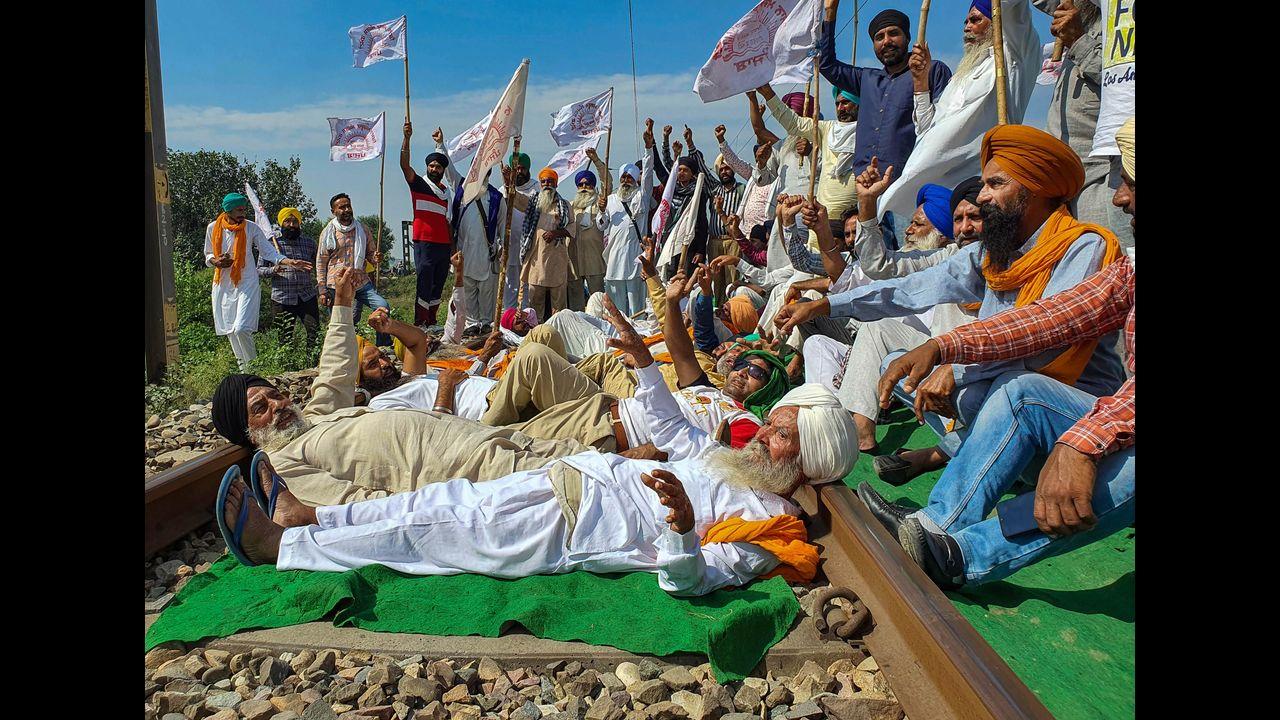 Hundreds of people had a harrowing time as rails did not ply due to the nationwide strike. Passengers were left stranded at railway stations in various towns and cities as trains were stranded. Pic/PTI