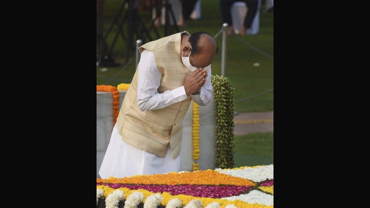 Lok Sabha Speaker Om Birla pays homage to Mahatma Gandhi on the occasion of his birth anniversary, at Rajghat in New Delhi on Saturday. Pic/ PTI
