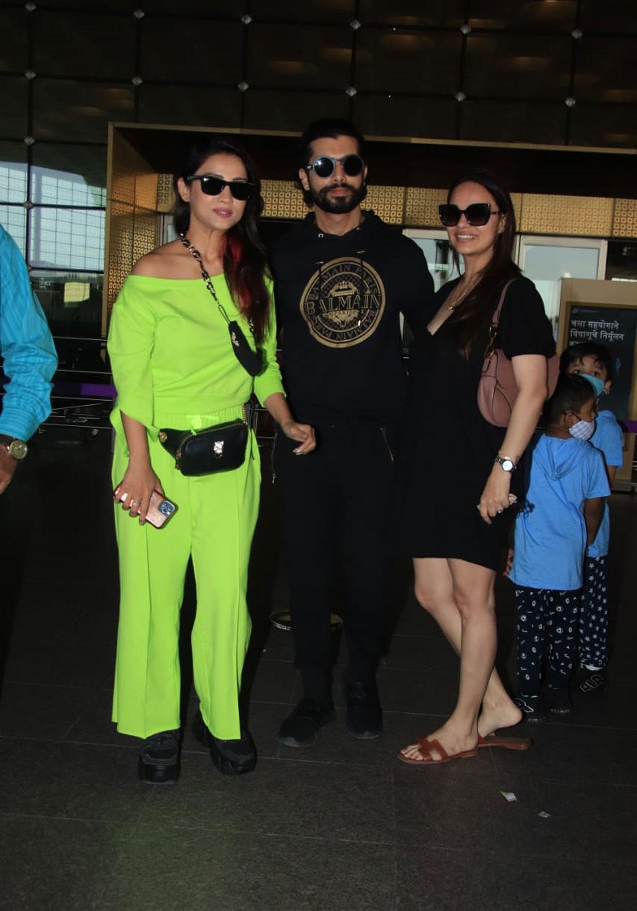 Sharad Malhotra and Ripci Bhatia bumped into 'Naagin' actress Adaa Khan at the airport, who rocked her neon green outfit like a boss.