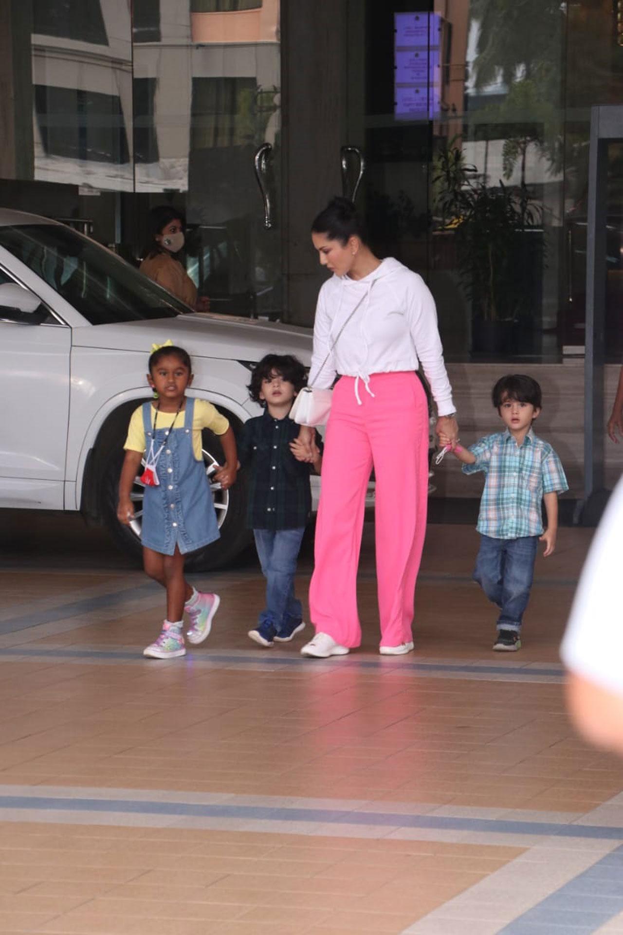 Sunny Leone and her kids make for quite a stylish lot. The family was spotted on their outing at a plush restaurant in Mumbai today.