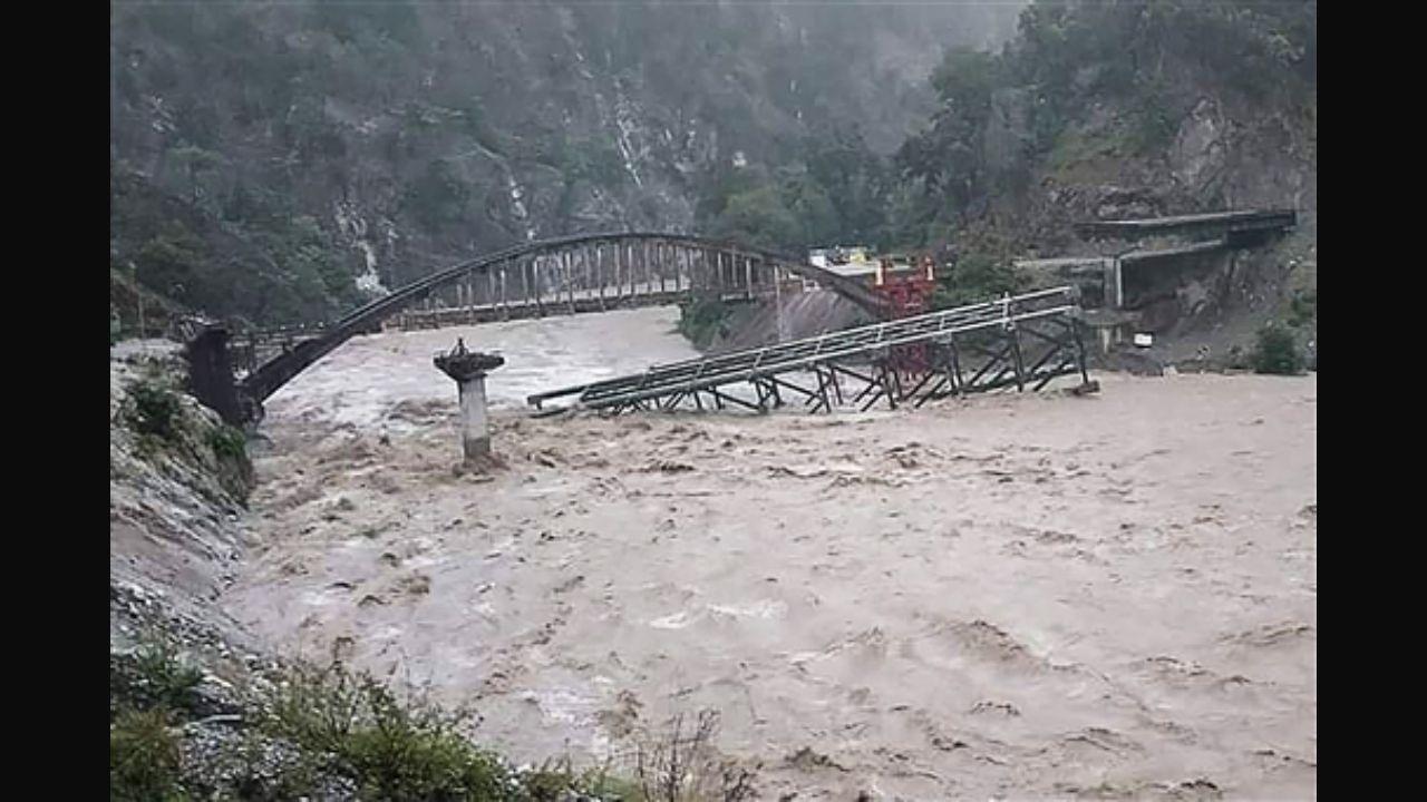 An under construction bridge is seen collapsed on a river along a national highway between Pithoragarh-Champawat, in Chalthi, Uttarakhand. Pic/AFP