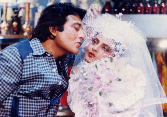 Twitterati remembered how Vinod Khanna's Qurbani co-star Feroz Khan, too, died on the same day in 2009. Some also noted the eerie similarity between Vinod Khanna and Feroz Khan's death. Feroz Khan passed away from cancer too. In picture: Vinod Khanna with Rekha.