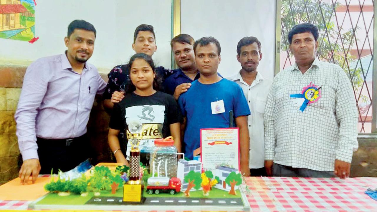 The students with a science competition prize
