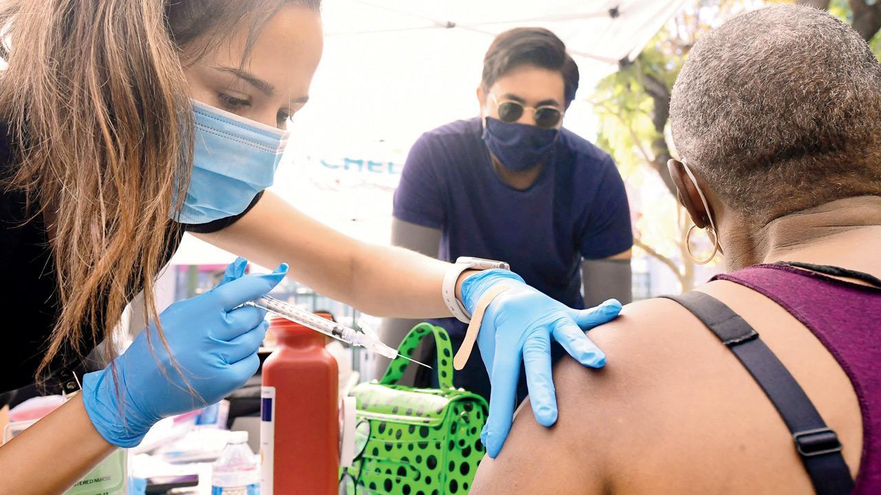 FDA backs Pfizer booster vaccinations for seniors, those in high-risk jobs