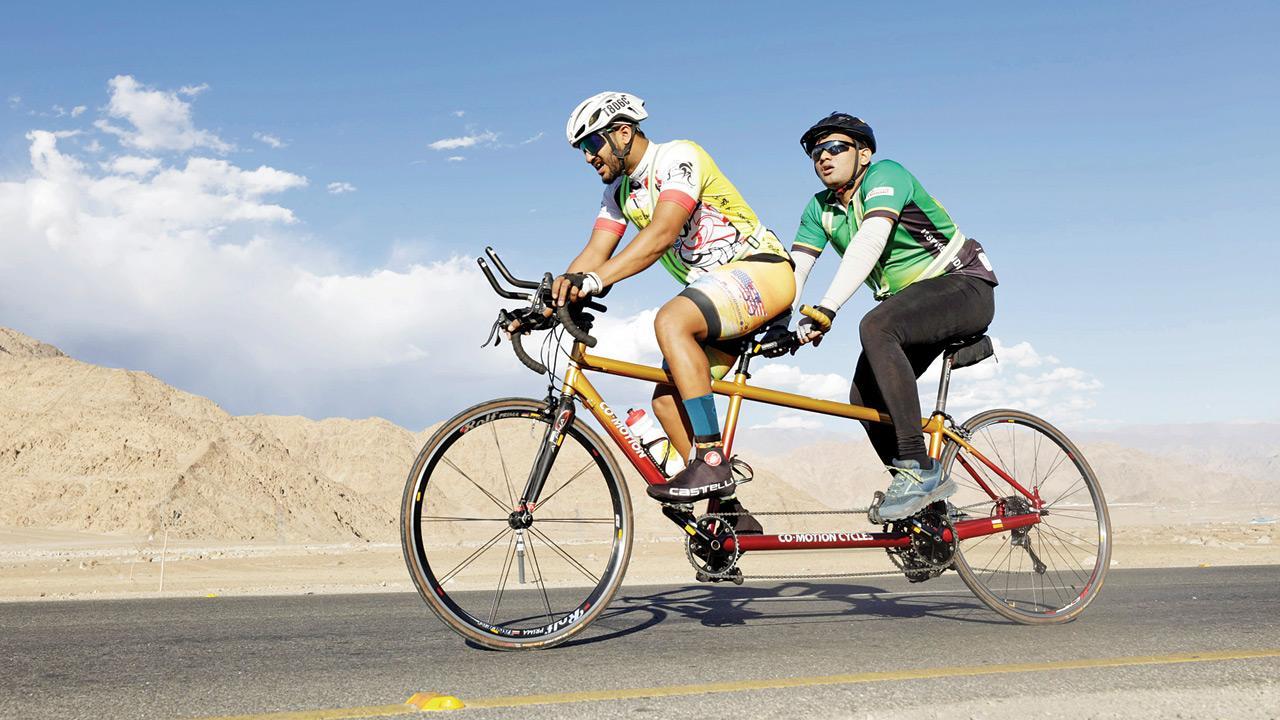Tandem cycling pair completes India’s toughest race in Leh