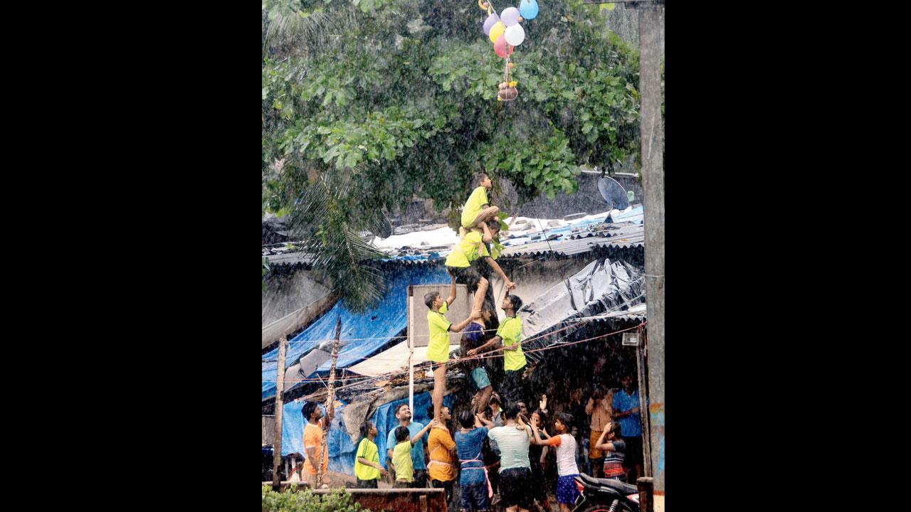 Mumbai: MNS workers break Dahi Handi, and law