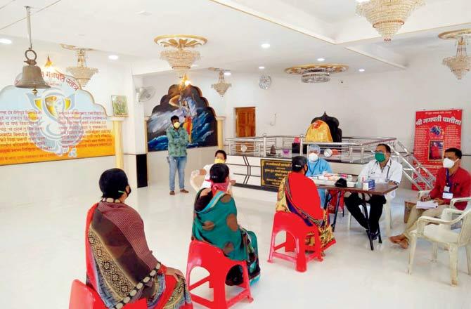 Residents of Vaijapur being screened at the city`s Ganesh temple