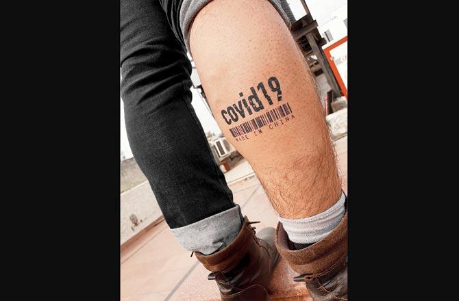 Mechanical engineer Varun Saklani got COVID-19: Made in China inked on his right calf in September