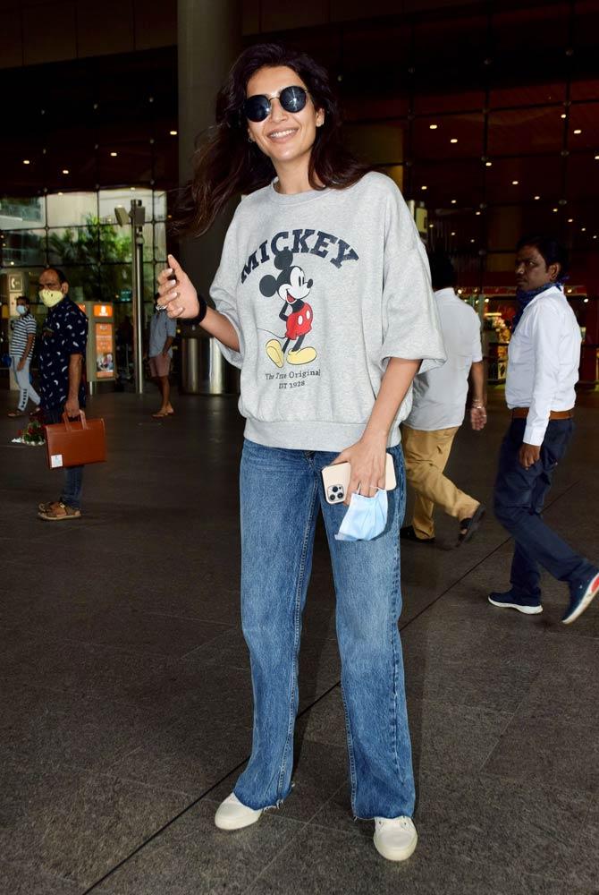 Karishma Tanna was casual in a Mickey sweatshirt and jeans when clicked at Mumbai airport. Karishma was seen in the film 'Lahore Confidential', which premiered on ZEE5.