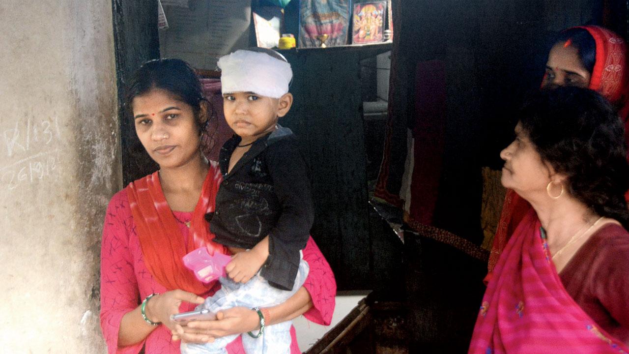 Ayush Yadav, the injured boy, with his family