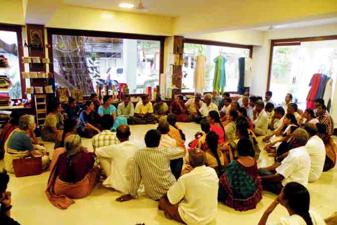 Weavers attend a meeting at a Dastkar Andhra store in Hyderabad. In the absence of an effective board, artisans wonder who will take their voices to the government