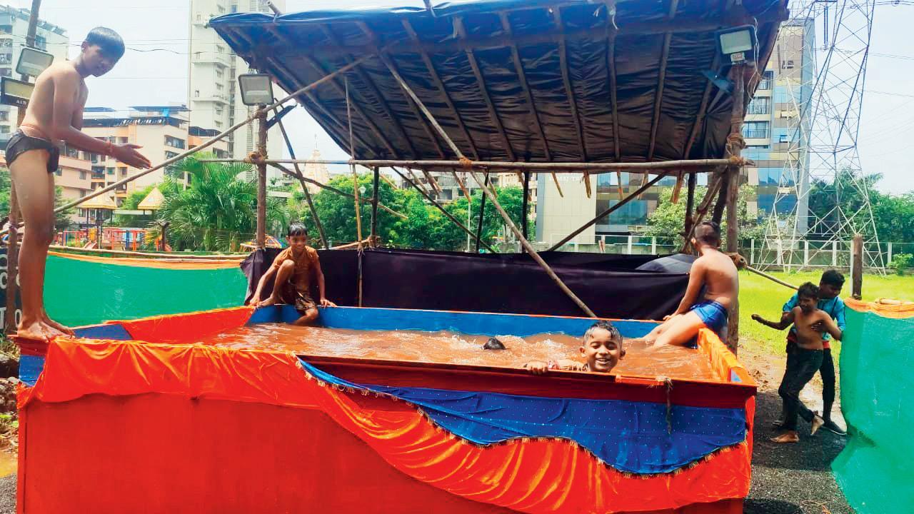 Kids turn artificial pond in Navi Mumbai into swimming pool