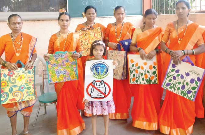Members of Elsie Gabriel`s Young Environmentalists Programme Trust celebrate an eco-Diwali with adivasis in Aarey