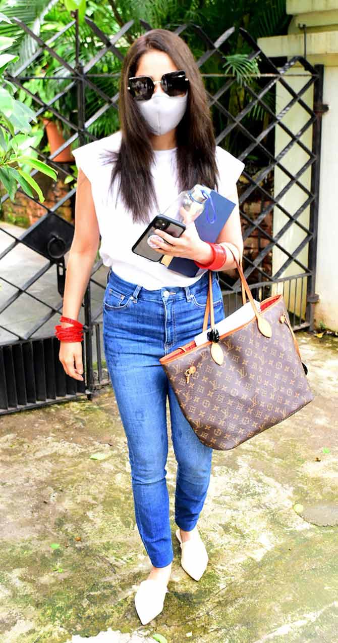 Yami Gautam was all masked up when spotted out and about in the city. The Uri actress wore a pair of blue denims and a white t-shirt for her outing.