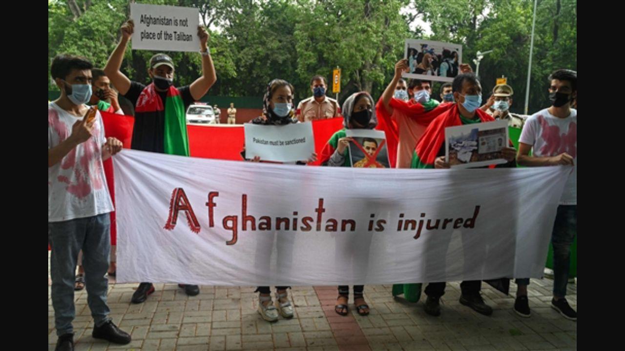 'Pakistan has been sending terrorists to our country for the last 40 years. They have torn our country into pieces. Pakistan's army is present in Afghanistan. All these Talibanis are Pakistanis,' said Afghan protesters to news agency IANS. Pic/AFP