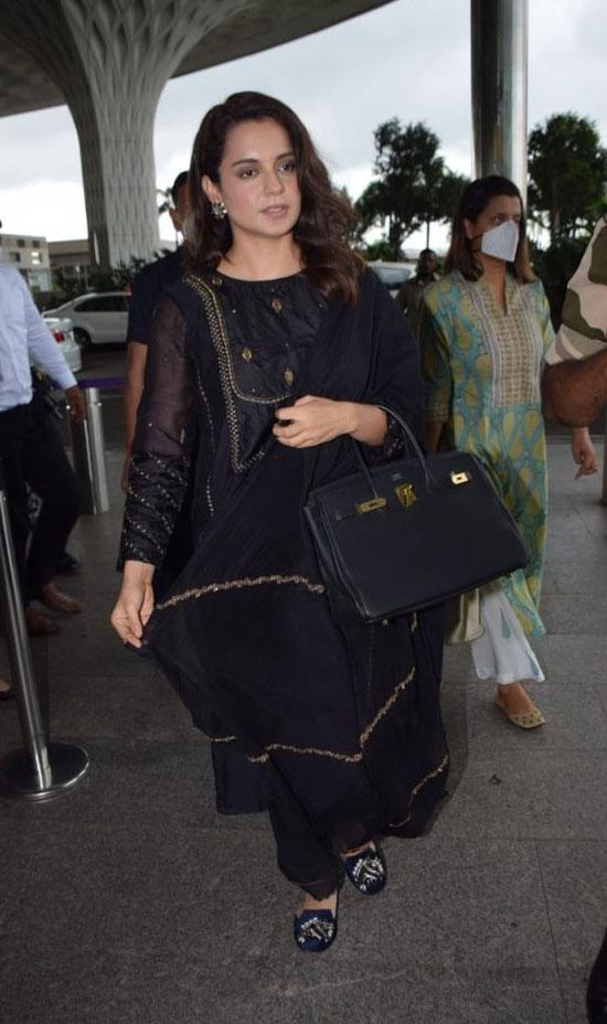 Kangana Ranaut was spotted at the airport in a black traditional attire. She's gearing up for the release of her next film 'Thalaivii' that's coming out in cinemas on September 10. 