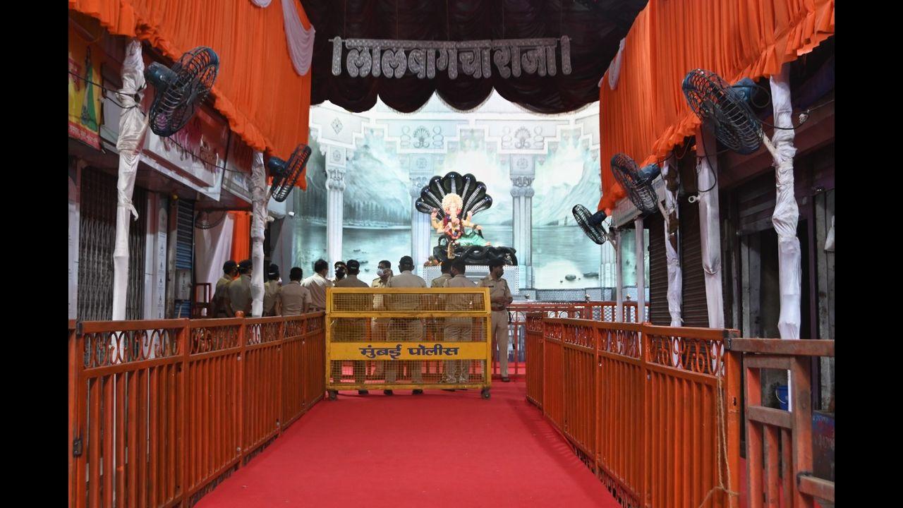 The local restrictions also barred devotees from entering the pandal to offer their prayers, forcing them to pray virtually. 