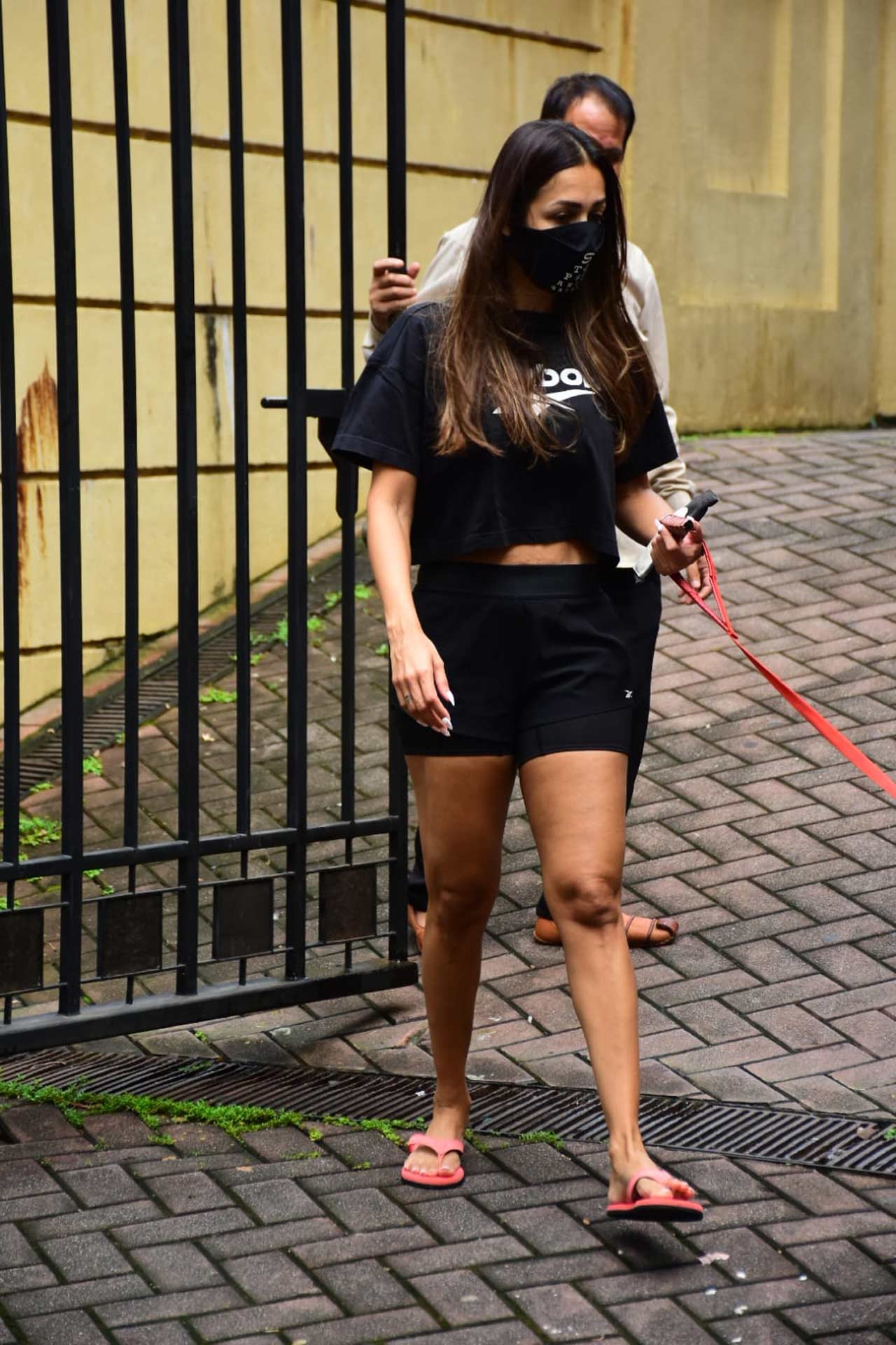 Malaika Arora, who was out for a walk later in the day, sported a black athleisure as she walked her pet, Casper.