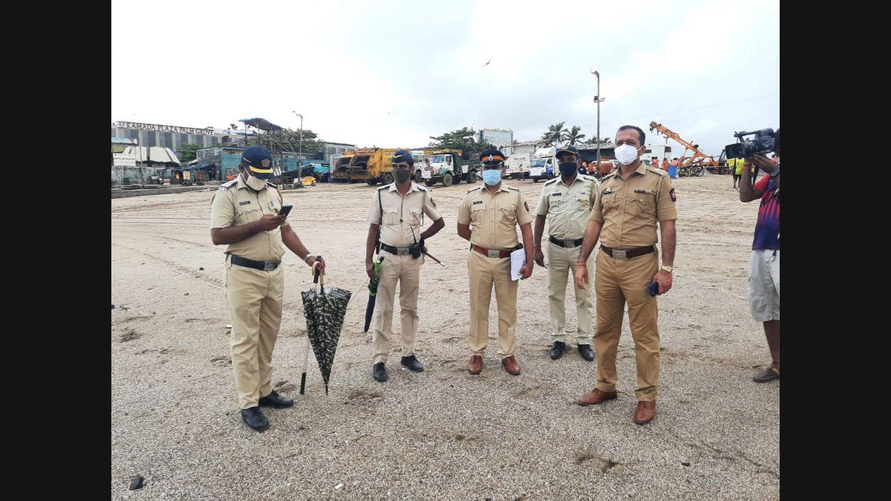 Police personnel inspecting the Juhu beach ahead of immersion of Lord Ganesha. Pic/Satej Shinde