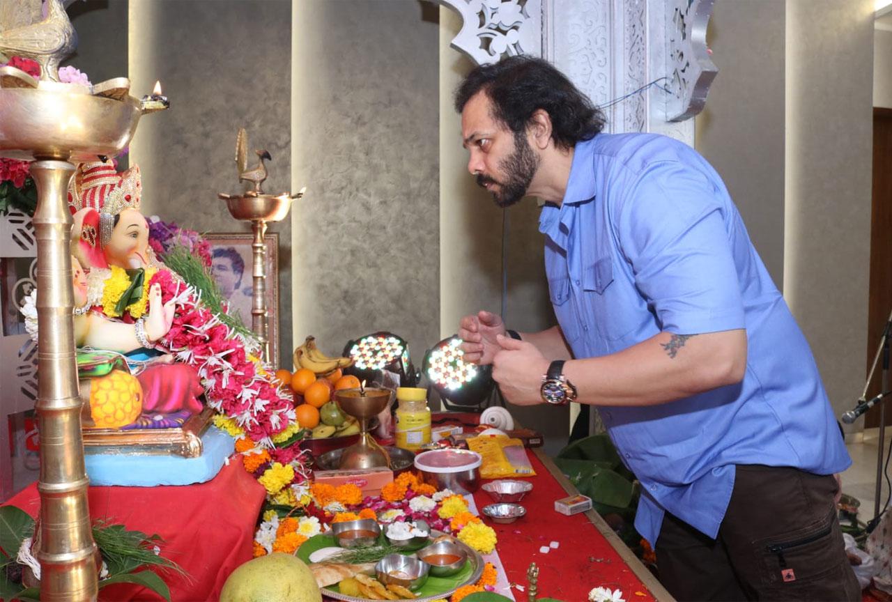 The blockbuster director too was offering his Darshan to Lord Ganesha's idol. Shetty, who is currently hosting 'Khatron Ke Khiladi 11', says that the show is very special for him and he is happy with the response that this action-based reality show is receiving from the audience.