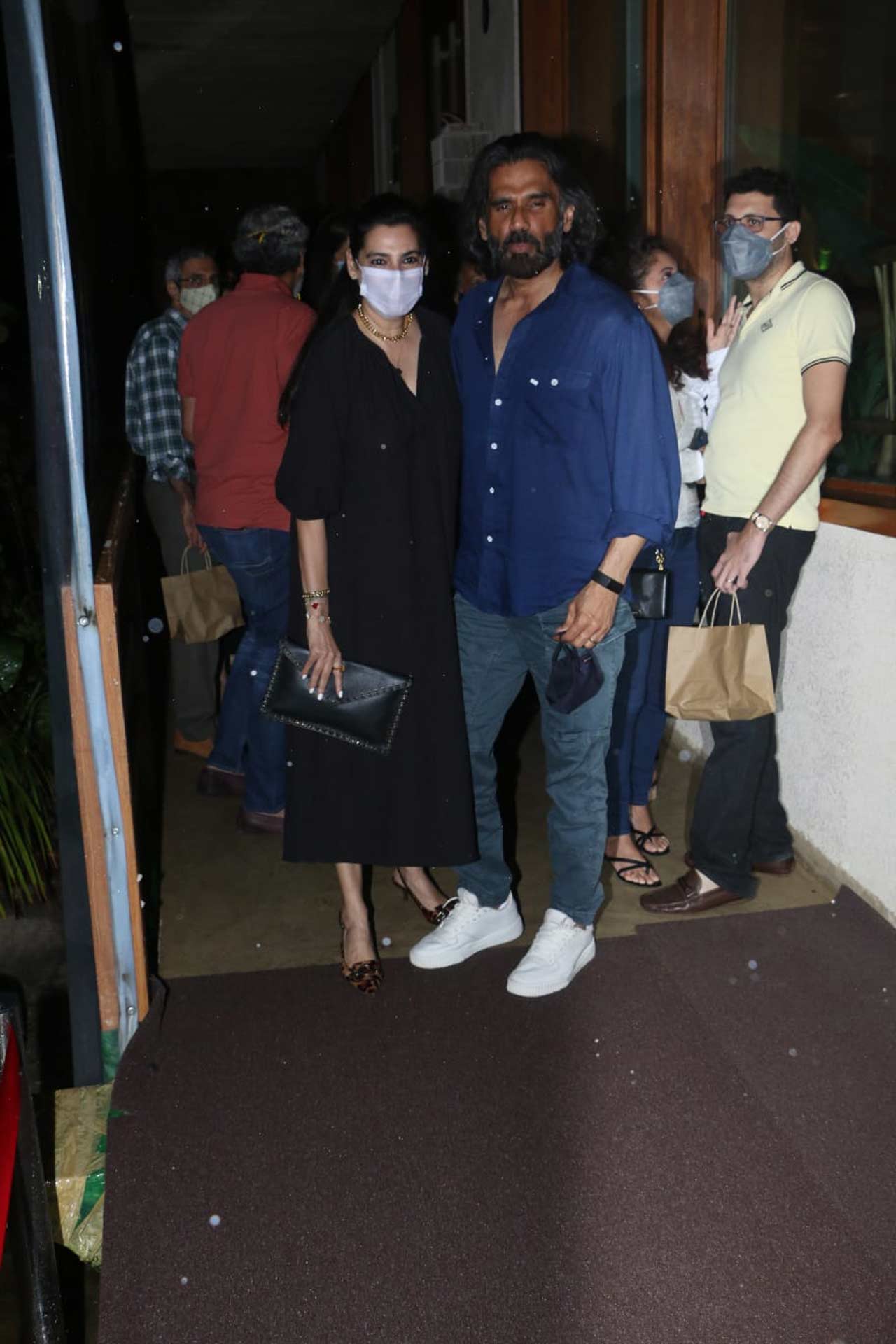 Suneil Shetty and Mana Shetty posed for the shutterbugs when clicked at a popular restaurant in the city. The actor was out on a dinner date with his wife.