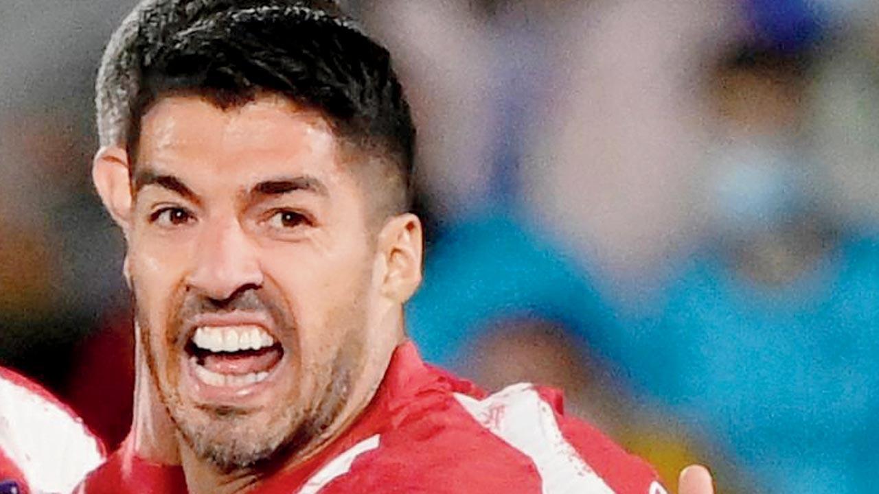 Suarez helps Atletico rally to down AC Milan