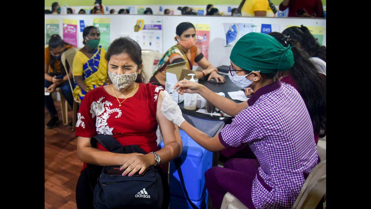 On both these days, eligible citizens from all categories concerned will be able to walk-in directly at all government and municipal vaccination centres in Mumbai to get vaccinated. Pic/PTI
 
 