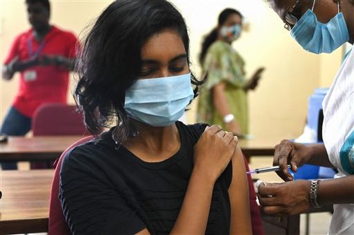 Over 2 crore Covid-19 vaccinations were done in India on September 17. This is the highest number of vaccination done in a single day. Pic/AFP