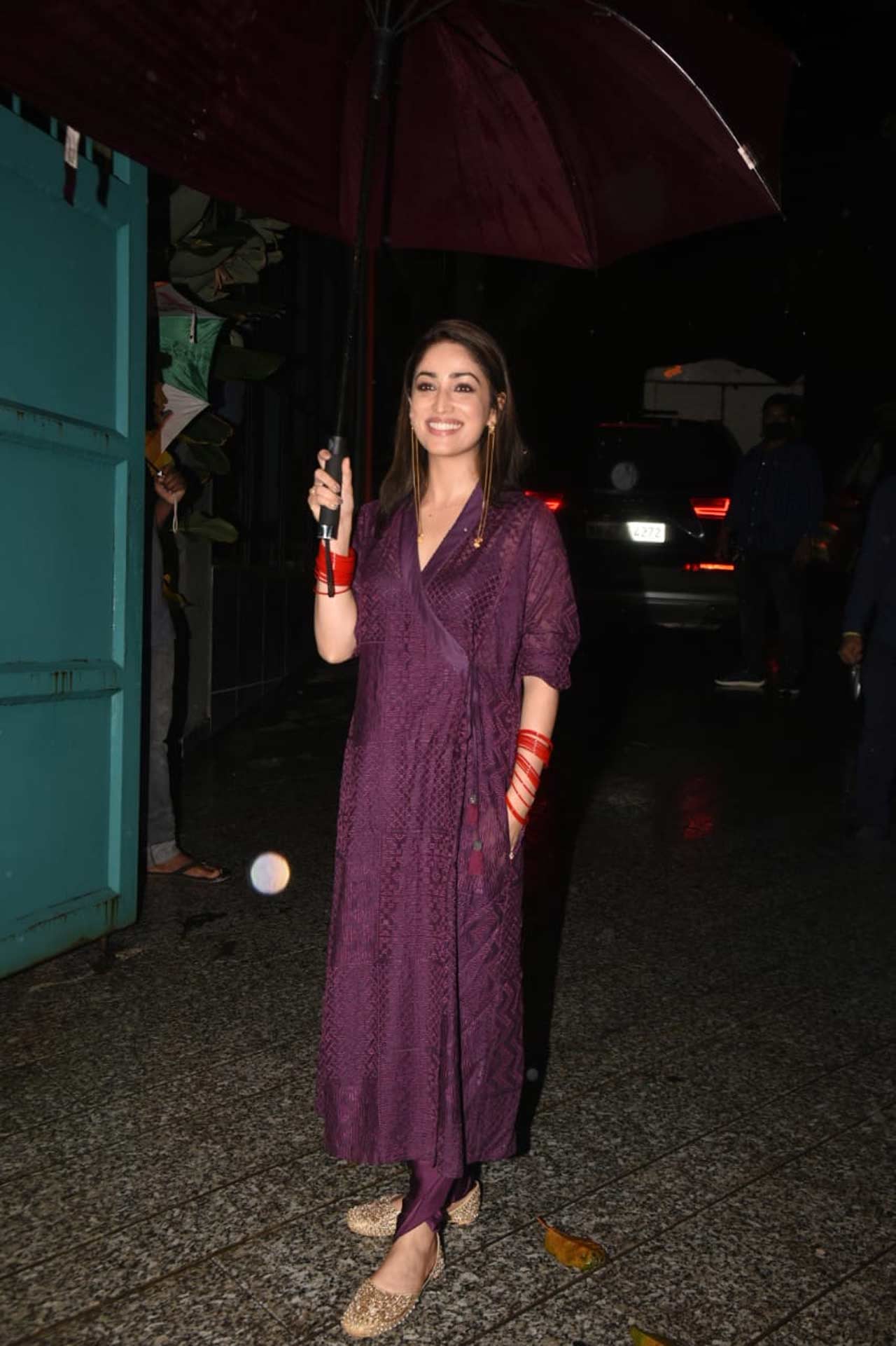 Kriti SaYami Gautam was all smiles when clicked at Dinesh Vijan's Bandra home. The actress opted for a wrap-around Kurti, paired with the same coloured pyjama during the outing. On the work front, she will be next seen in 'Bhoot Police.'