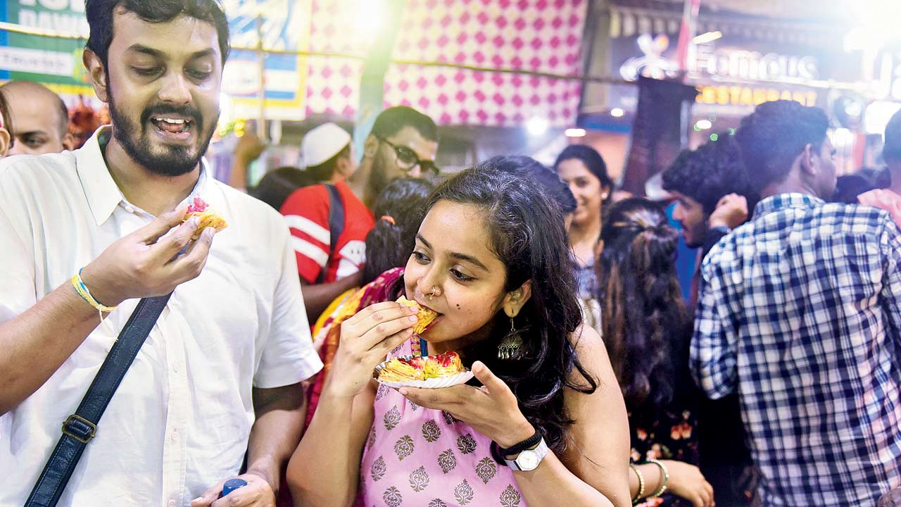 Aparna Bhat enjoying khaja with her friend at Suleman Usman Mithaiwala