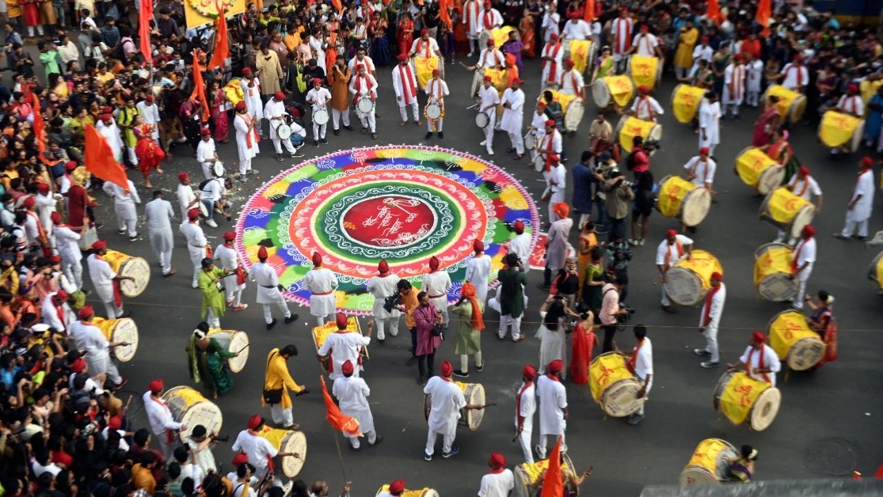 The festival is observed with colourful floor decorations, a special Gudi flag garlanded with flowers, mango and neem leaves, and topped with upturned silver or copper vessel, street processions, dancing and festive foods like shrikhand puri. Pic/Satej Shinde