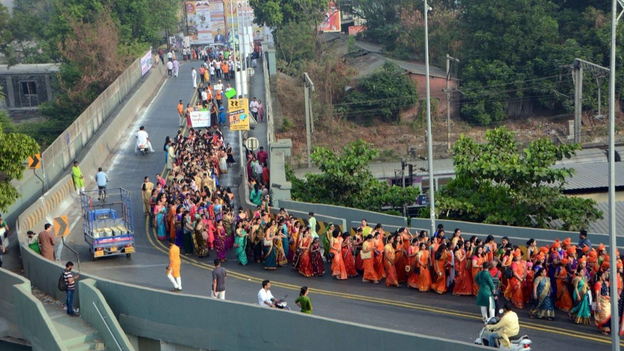 Women dressed in their nine-yard paithanis take part in the Maharashtrian New Year procession after two years of low-key celebration. Pic/ Satej Shinde