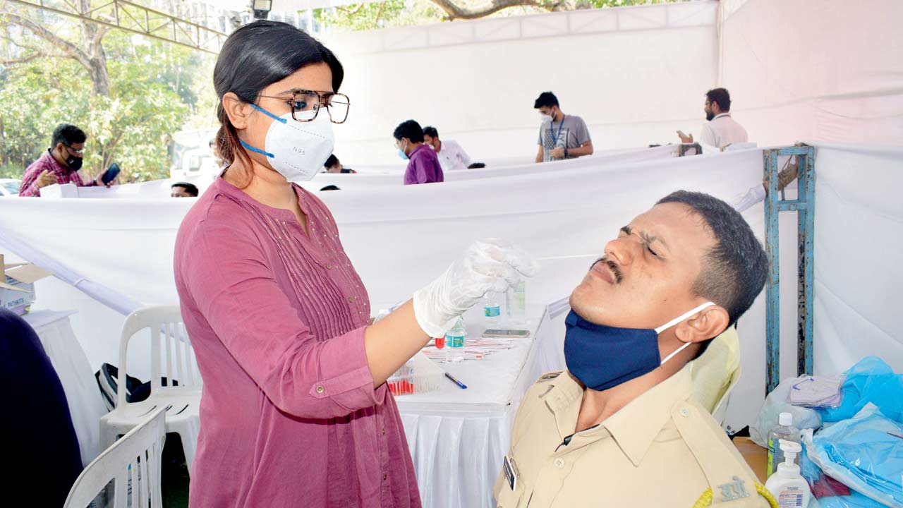 A swab sample being collected at Vidhan Bhavan on March 1. Pic/Suresh Karkera