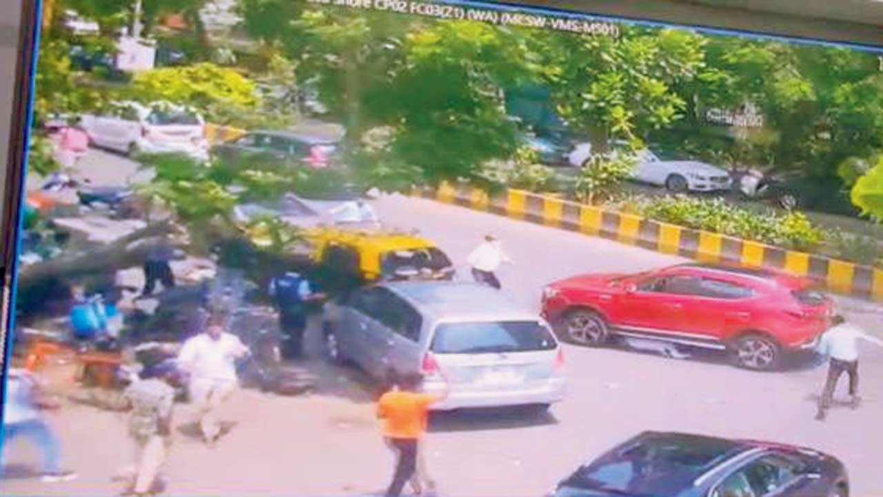 The moment the taxi in front of the racing car crushes the head clerk to death
