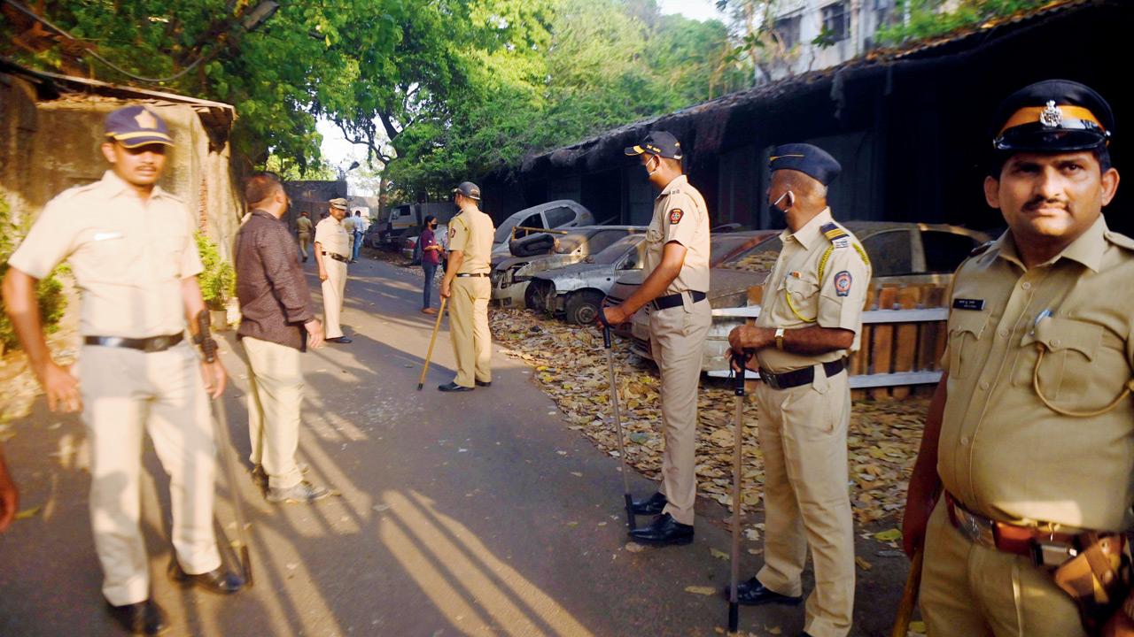 Cops outside Yellow Gate police station where the arrested protesters were taken
