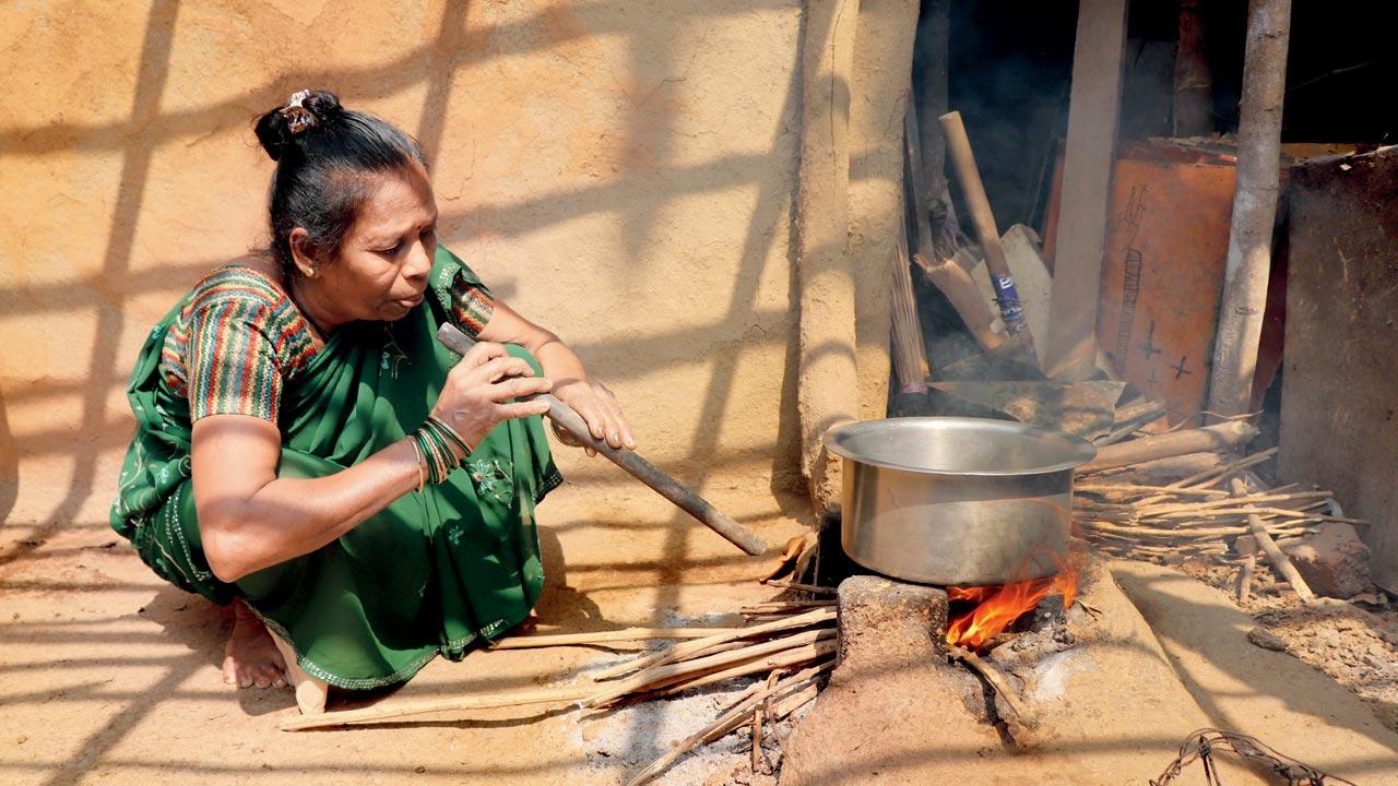 Laxmi Vangad uses a chulha at her Aarey home on Thursday