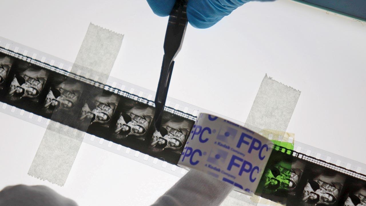 The closeup of a strip being glued