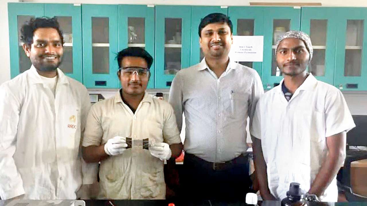 (First from left) Shobhnath Gupta and (third from left) Dr Pravin Walke with the team that developed the carbon tube