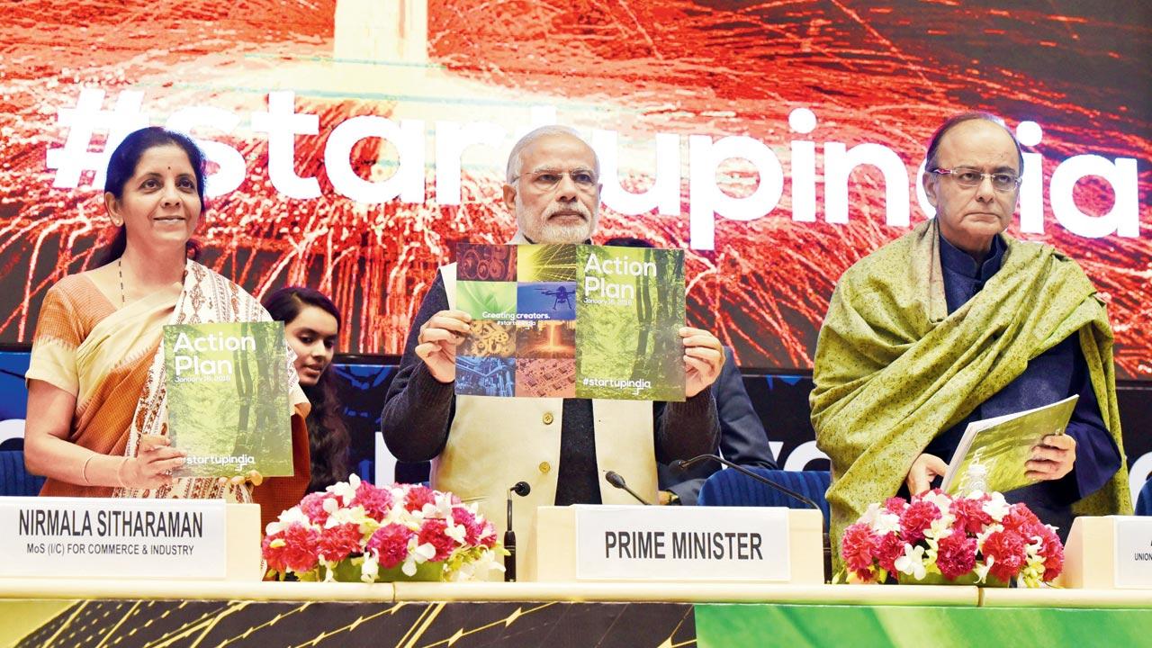 Prime Minister Narendra Modi, Finance Minister Arun Jaitley and Minister of States for Independent Charge Nirmala Sitharaman releasing the Action Plan at the launch of Start-Up India at Vigyan Bhavan on January 16, 2016 in New Delhi. Pic/Getty Images