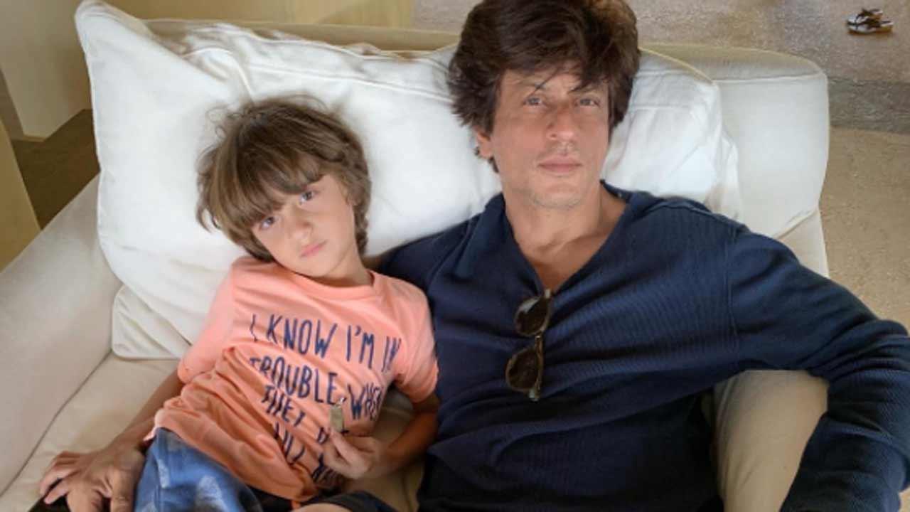 Shah Rukh Khan sports a big smile as he takes Suhana, AbRam out for a car drive