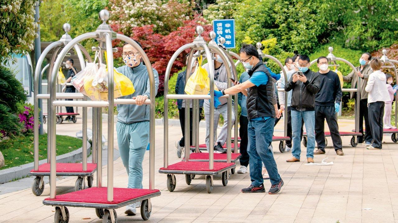 Covid-19 cases continue to rise to record high in Shanghai