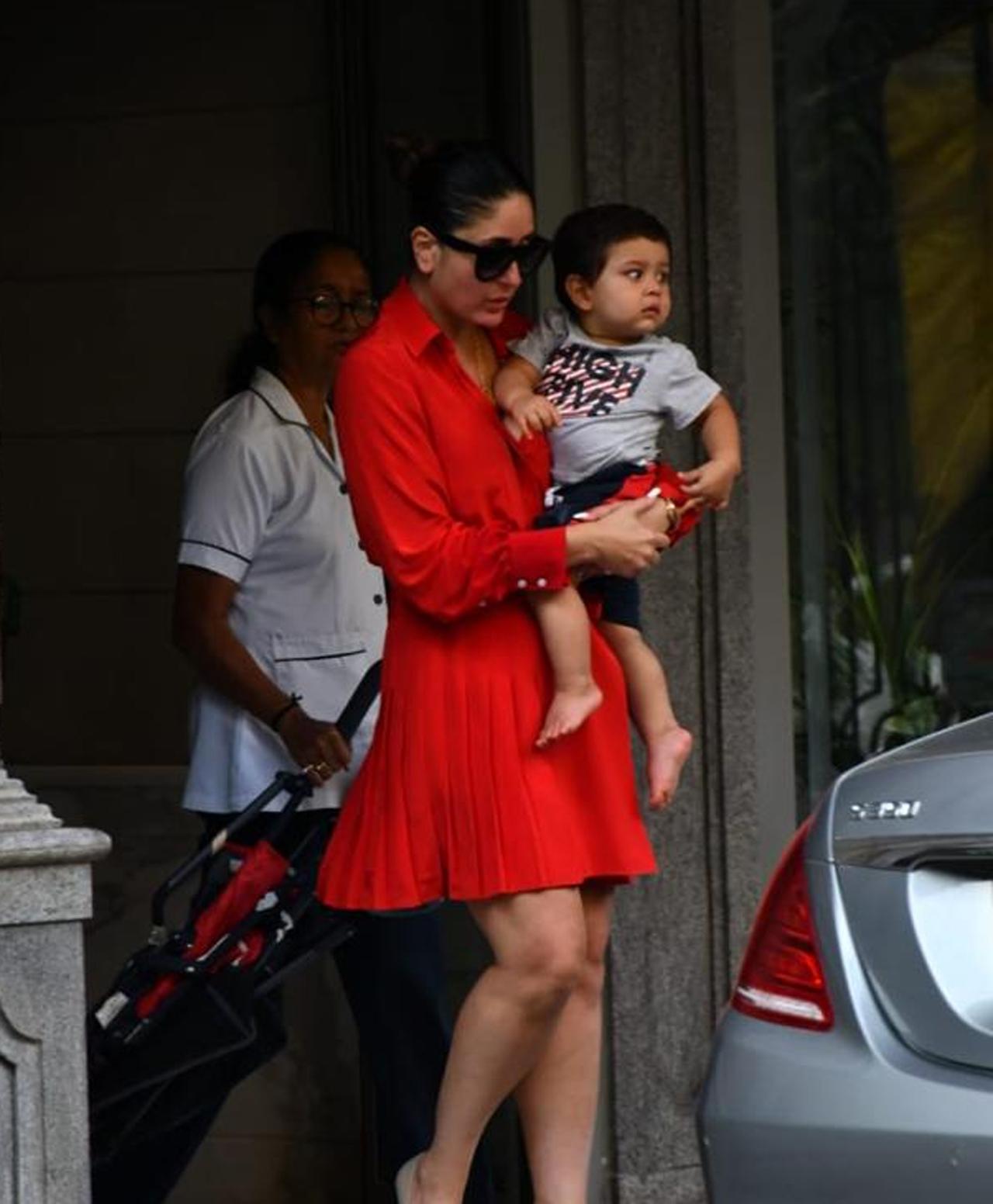 Kareena Kapoor, Jehangir Ali Khan were seen at Randhir Kapoor`s residence for the occasion too. Kareena looked ravishing in her red dress whereas Jeh, as always, looked cute as a button with those wide eyes and edible cheeks. Kareena Kapoor, Jehangir Ali Khan were seen at Randhir Kapoor`s residence for the occasion too. Kareena looked ravishing in her red dress whereas Jeh, as always, looked cute as a button with those wide eyes and edible cheeks.