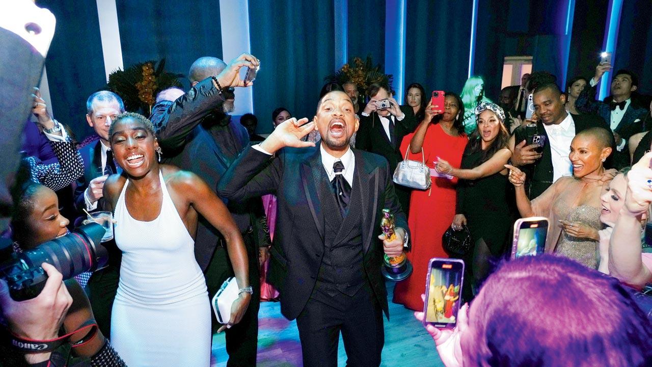 Smith and Jada Pinkett Smith (right) attended the 2022 Vanity Fair Oscar Party hosted by Radhika Jones at Wallis Annenberg Center for the Performing Arts right after the notorious awards ceremony, with no trace of the fracas that had unfolded on stage.  Rock chose not to comment on the incident at all and was seen at Madonna’s manager Guy Hoseary’s after-party